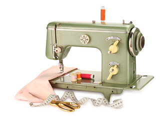 Sewing machine with pink fabric, measuring tape, scissors and spools of threads isolated on white