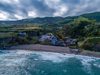 Praia dos Moinhos. Aerial drone view of volcanic black sand beach in Moinhos town, Sao Miguel,...