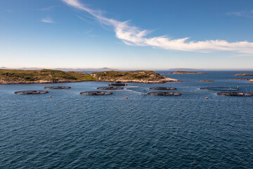 Salmon Fishing Farms Aquaculture Along the Norway Coast Near Lauvøya Island, Midsummer