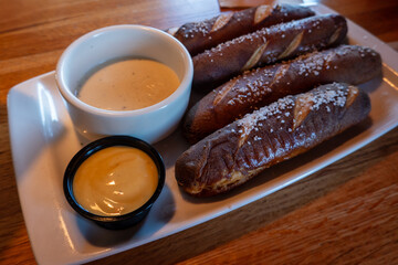 Appetizing Pretzel Platter with Cheese and Mustard
