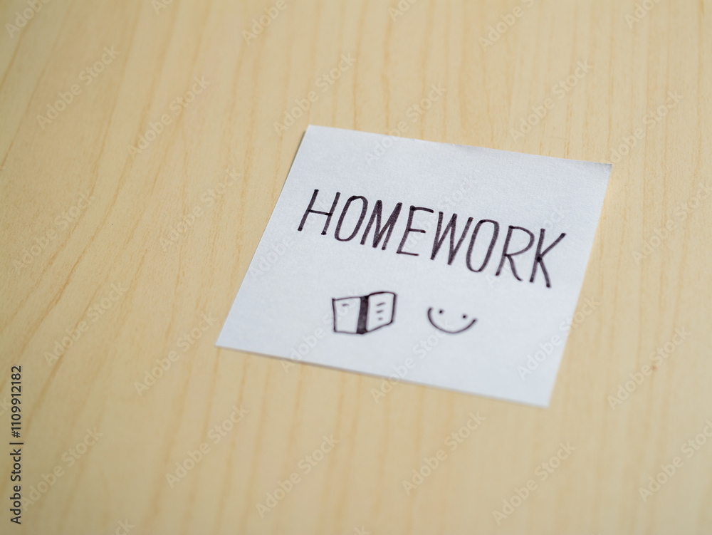 Poster Homework reminder note study materials on student desk in indoor learning environment