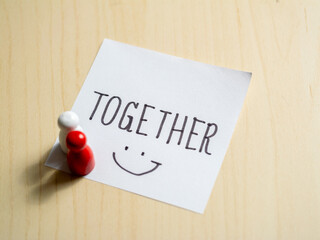 Creative collaboration in a minimalist setting inspiring togetherness and positive vibes