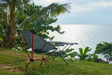incredible view from the tourist tent on the seashore, opening the tent door, folding chair and...