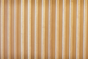 Fototapeta premium Wood light brown texture vertical patterns on wall background