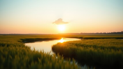 A winding river meanders through a vast green meadow bathed in the golden glow of a setting sun, casting long shadows on the verdant landscape.
