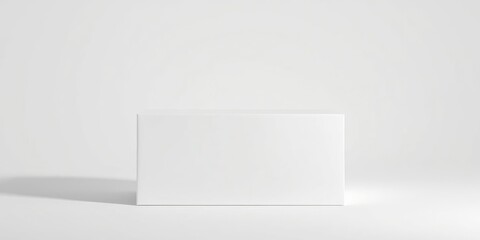 A single white cube sits on a minimalist white background, creating a clean and simple scene for showcasing products or designs.
