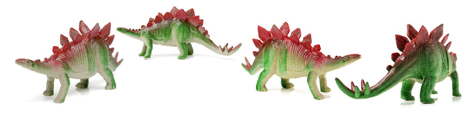 dinosaurs toys on white background