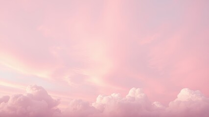 Obraz premium Soft Pink Clouds Against a Dreamy Sky with a Light Wash of Pastel Colors