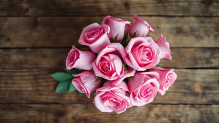 Naklejka premium A bouquet of pink roses, delicate and soft, resting on a weathered wooden surface, symbolizing beauty, love, and the passage of time.