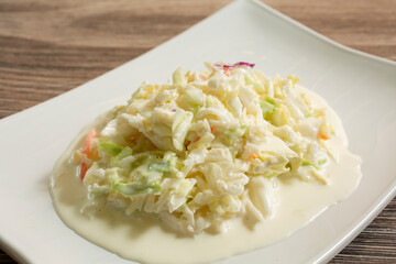 A view of a plate of coleslaw.