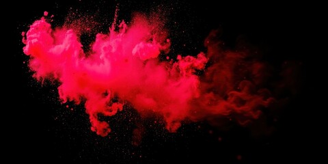 A vibrant red explosion of color against a dark background, creating a dynamic and abstract composition.