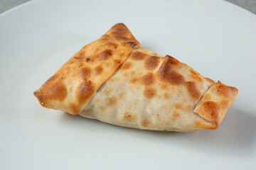 A closeup view of a Russian chicken pie pastry called kurnik. © DAVID