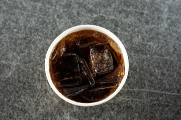 A top down view of a cup of cola. © DAVID