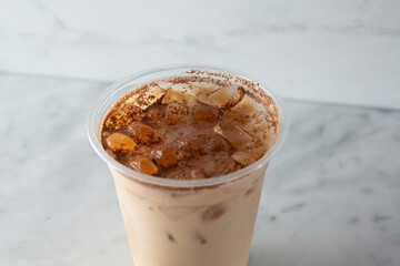 A view of an iced chai latte.