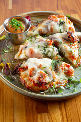 A view of a flatbread pizza.