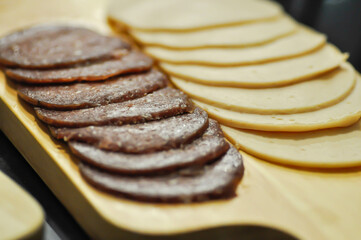 salami and ham , pork sausage or sliced sausage or kulen or kulenova seka