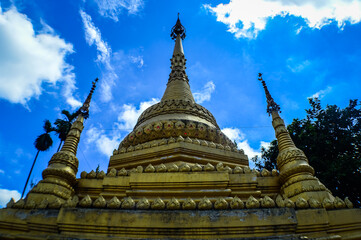 Fototapeta premium Gold Pagoda, Lanna Architecture, Symbols of Buddhism, South East Asia at Ko Klang temple, Muang Chiang Mai, Chiang Mai, Northern Thailand