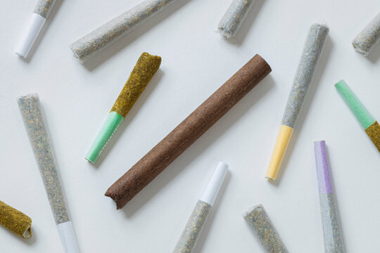 an arrengement of various pre-rolled cannabis joints and blunts