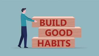 Build good habits concept with a man arranges wooden blocks with the text build good habits