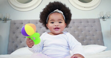 Cute baby playing on bed in high quality