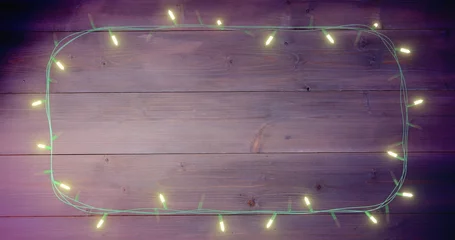 Gordijnen Image of dairy lights on wooden background © vectorfusionart