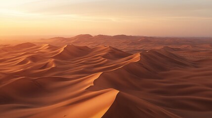 Naklejka premium A desert landscape with sand dunes and a sunset in the background
