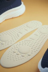 A CloseUp Image of Soft Shoe Insoles Displayed on a Colorful Background