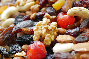 Closeup of mixed nuts and dried fruits highlighting their beauty and texture