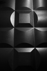 Abstraction with square and round, metallic figures.