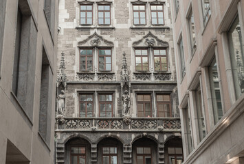 Exterior design of famous New Town Hall (Neue Rathaus) on Marienplatz square in Munich.