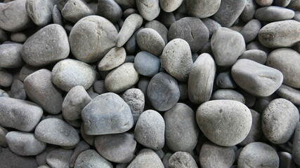 The background of pebbles arranged into a background
