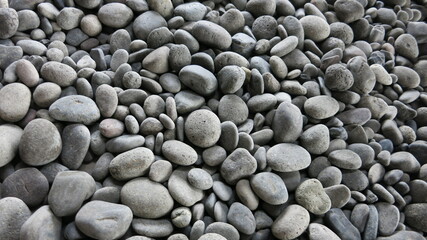 The background of pebbles arranged into a background