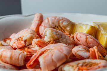 Tiger king prawns cooked and seasoned with lemon, close up