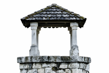 A stone well with a thatched roof, designed for water collection.