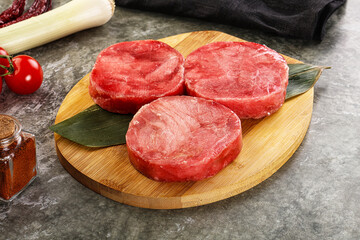 Delicous raw tuna medallion for cooking