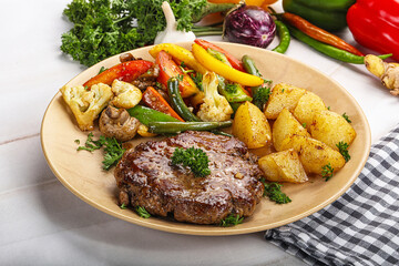 Roasted beef steak with potato