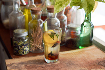 a Glass of Spices Herbal Drink Served on the Wooden Table