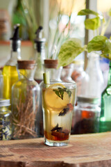 a Glass of Spices Herbal Drink Served on the Wooden Table