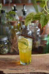 a Glass of Spices Herbal Drink Served on the Wooden Table