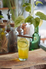 a Glass of Spices Herbal Drink Served on the Wooden Table