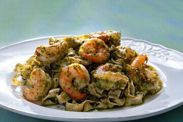 seafood pasta in pesto sauce
