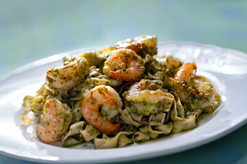 seafood pasta in pesto sauce