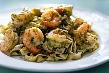 seafood pasta in pesto sauce