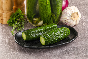 Homemade lighty salted cucumbers with herbs