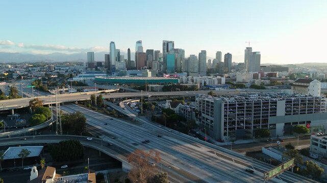 A beautiful aerial view of the vibrant downtown city skyline captured at sunrise