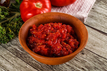 Diced ripe tomato with sauce