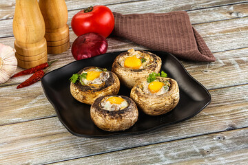Baked champignon with quail egg