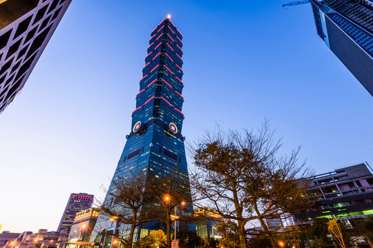Taipei, Taiwan- March 27, 2017: Low-angle view of Taipei 101 skyscrapers in Taipei, Taiwan. The Xinyi District is Taipei's main shopping area, anchored by several department stores and malls.