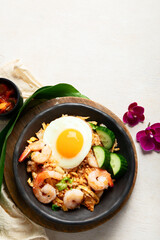 Nasi goreng- Indonesian fried rice with fried egg.