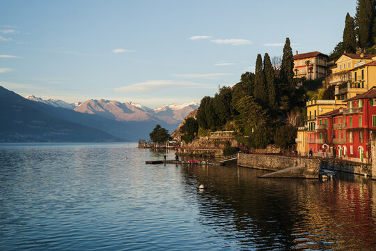 Colourful Varenna village against mountain range and blue sky